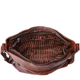 Brown Jack Georges Voyager Crossbody Bag showing adjustable strap, front pocket, and sleek leather design.