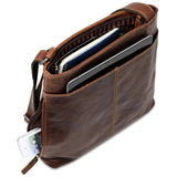 Brown Jack Georges Voyager small zippered crossbody bag with adjustable strap and multiple compartments.