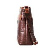 Brown Jack Georges Voyager zippered crossbody hobo bag with adjustable strap and spacious interior for everyday use.