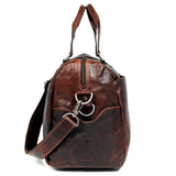 Jack Georges Voyager Day Bag or Duffle in brown leather with handles and zipper closure, designed for travel and daily use.