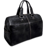 Black Jack Georges Voyager Day Bag duffle with multiple pockets, leather accents, and sturdy handles on a plain background.