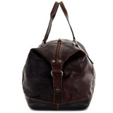 Brown Jack Georges Voyager duffle bag with leather accents and sturdy handles, suitable for travel and weekend trips.