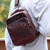 Jack Georges Voyager Sling Bag in brown, showing the stylish leather design and adjustable strap for everyday use.