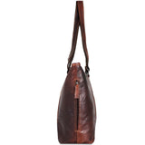 Brown Jack Georges Voyager Shopper tote bag shown from the side, featuring spacious design and sturdy handles.