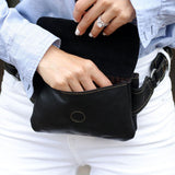 Brown Jack Georges Voyager waist pack with handsfree belt design, compact and stylish for carrying essentials.
