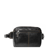 Brown Jack Georges Voyager large travel belt bag worn around the waist, featuring multiple compartments and a sleek design.
