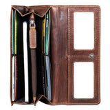 Brown Jack Georges Voyager clutch wallet with multiple card slots and a sleek leather design.
