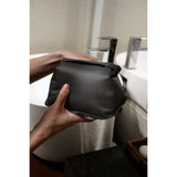 Matador FlatPak™ Toiletry Case in black, compact accessory with durable design for travel organization.