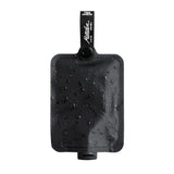 Matador FlatPak™ Toiletry Bottle accessory with compact, durable design for travel toiletries, shown in a neutral setting