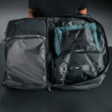 Matador GlobeRider45 travel backpack in white with multiple compartments and adjustable straps, designed for durable travel use.