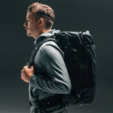 Matador GlobeRider45 travel backpack in white, featuring durable design, multiple compartments, and ergonomic straps for comfortable travel.