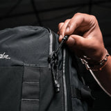 Matador GlobeRider45 travel backpack in white, featuring multiple compartments and durable design for outdoor adventures.