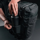 Matador GlobeRider45 travel backpack in white with multiple compartments, designed for organized packing and durable outdoor use.