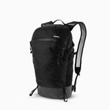 Matador Freefly16 packable backpack shown in black, folding into a compact size for easy storage and travel.
