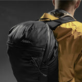 Matador Freefly16 packable backpack in black, lightweight and compact, shown with straps and foldable design for travel and outdoor use.