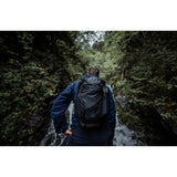 Matador Freerain22 waterproof packable backpack in black, showing its compact design and durable waterproof material.