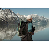 Matador Freerain22 waterproof packable backpack in black, showing its compact, lightweight design and adjustable straps.