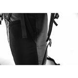 Matador Freerain22 waterproof packable backpack, compact and lightweight outdoor gear, shown in blue with adjustable straps and waterproof material.