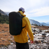 Matador Transit30 duffle bag shown from the back with adjustable shoulder strap and durable fabric, ideal for travel and outdoor use.