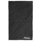 Matador Mini Pocket Blanket in black, a compact travel essential perfect for outdoor picnics and outdoor adventures.