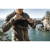 Matador Freerain waterproof packable waist pack in black, designed for outdoor activities, with adjustable strap and compact storage.