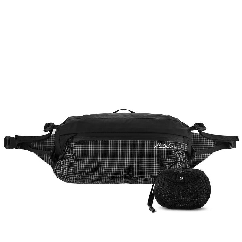 Matador Freerain waterproof packable waist pack showing its compact, lightweight design and adjustable strap for outdoor activities.