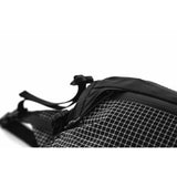 Matador Freerain waterproof packable hip pack with adjustable waist strap and compact design for outdoor activities.