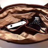 Black Osgoode Marley Small Crossbody Traveler bag with adjustable strap and compact design, ideal for everyday use.