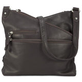 Black Osgoode Marley Kriss Kross Traveler handbag with multiple compartments and adjustable straps, stylish and functional for travel.