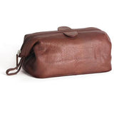 Black Osgoode Marley Facile Top Travel Kit with multiple compartments, compact toiletry kit for organizing travel essentials.