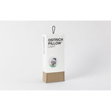 Light blue Ostrichpillow accessories with versatile pillow design, ideal for travel and relaxation.