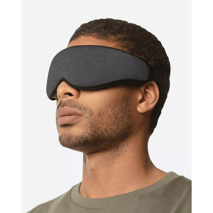 Ostrichpillow eye mask in soft fabric with adjustable strap, designed for comfortable sleep and relaxation.