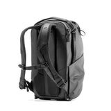 Black Peak Design Everyday Backpack with multiple compartments, side pockets, and padded shoulder straps for comfortable carrying.