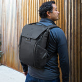 Black Peak Design Everyday Backpack with sleek exterior, featuring durable material and multiple compartments for everyday use.