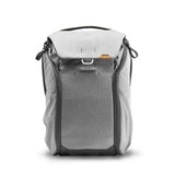 Peak Design Everyday Backpack in ash color, showing a sleek, modern backpack with multiple compartments and minimalist design.