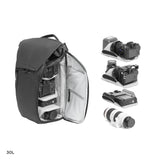 Black Peak Design Everyday Backpack opened to show organized interior with compartments and gear storage.