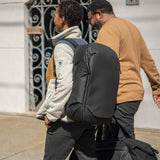 Black Peak Design Travel Backpack 30L with multiple compartments and padded straps, suitable for travel and everyday use.