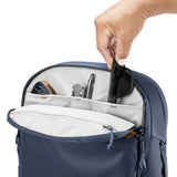 Peak Design Travel Backpack 30L in midnight color, showing the sleek exterior with multiple compartments and padded straps.