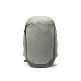 Peak Design Travel Backpack 30L in sage green, showing sleek exterior with multiple compartments and adjustable straps.