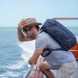 Peak Design 30L Travel Backpack in Midnight color, showing sleek exterior with adjustable straps and multiple compartments.
