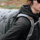 Peak Design Travel Backpack 45L in Half Moon Bay color, showing the sleek exterior with multiple compartments and durable straps.
