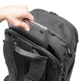 Peak Design Travel Backpack 45L showing front view with multiple compartments and padded shoulder straps in black fabric.