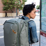 Peak Design Travel Backpack 45L with multiple compartments, padded shoulder straps, and sleek black exterior.
