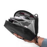 Peak Design Tech Pouch with multiple compartments and zipper closure, designed for organizing tech accessories and cables.