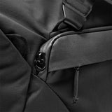 Black Peak Design Travel Duffel 35L with sturdy handles and adjustable shoulder strap, shown open with spacious interior.
