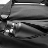 Black Peak Design Travel Duffel 35L bag with sturdy handles and adjustable shoulder strap, showcasing its spacious design and durable material.