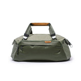 Peak Design Travel Duffel 35L in sage green, showing the spacious main compartment and durable travel bag design.