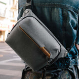 Peak Design Everyday Sling in ash color, compact sling bag with adjustable strap, designed for organized daily carry.