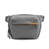 Peak Design Everyday Sling in ash color, compact shoulder bag with adjustable strap and multiple compartments for everyday carry.
