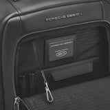 Porsche Design Roadster Backpack M in black with multiple compartments, adjustable straps, and sleek modern design.